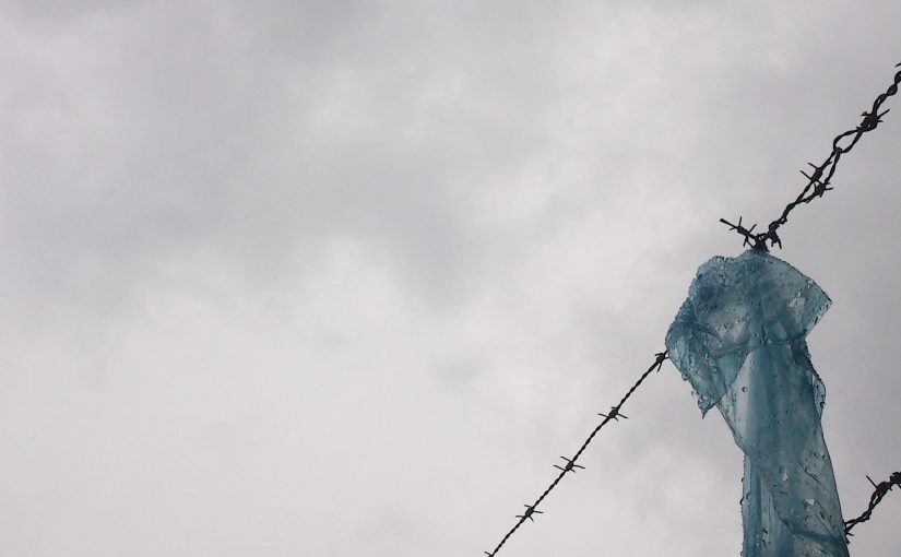 Blocked off canal path and plastic bag